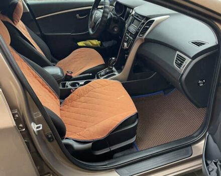 Коричневый Хендай i30, объемом двигателя 1.6 л и пробегом 119 тыс. км за 12950 $, фото 28 на Automoto.ua