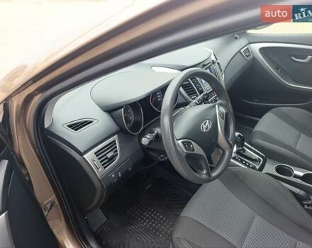 Коричневый Хендай i30, объемом двигателя 1.58 л и пробегом 56 тыс. км за 13650 $, фото 12 на Automoto.ua