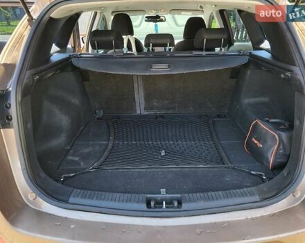 Коричневий Хендай i30, об'ємом двигуна 1.58 л та пробігом 234 тис. км за 9300 $, фото 4 на Automoto.ua