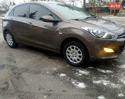 Коричневый Хендай i30, объемом двигателя 1.4 л и пробегом 170 тыс. км за 8800 $, фото 1 на Automoto.ua