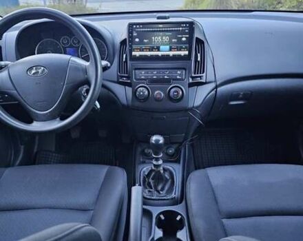 Червоний Хендай i30, об'ємом двигуна 1.4 л та пробігом 197 тис. км за 4047 $, фото 7 на Automoto.ua