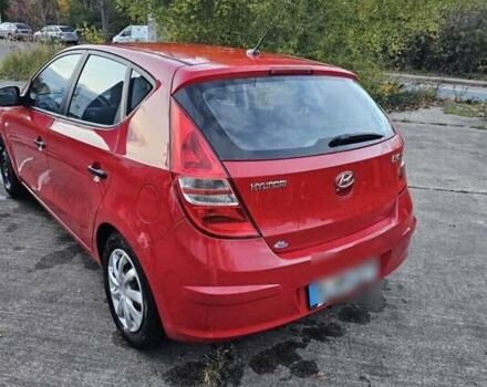 Червоний Хендай i30, об'ємом двигуна 1.4 л та пробігом 197 тис. км за 4047 $, фото 2 на Automoto.ua