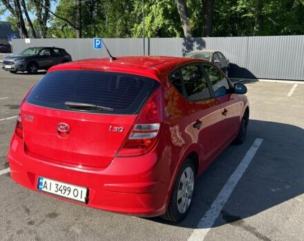 Червоний Хендай i30, об'ємом двигуна 0.14 л та пробігом 264 тис. км за 4399 $, фото 2 на Automoto.ua