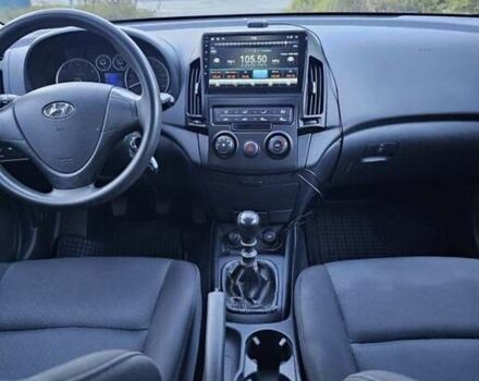 Червоний Хендай i30, об'ємом двигуна 1.4 л та пробігом 197 тис. км за 4047 $, фото 6 на Automoto.ua