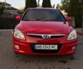 Красный Хендай i30, объемом двигателя 1.4 л и пробегом 242 тыс. км за 6200 $, фото 1 на Automoto.ua