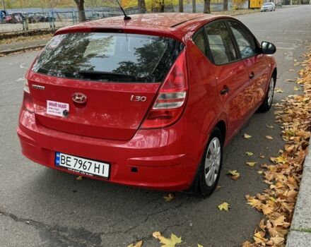 Красный Хендай i30, объемом двигателя 1.4 л и пробегом 212 тыс. км за 4300 $, фото 6 на Automoto.ua