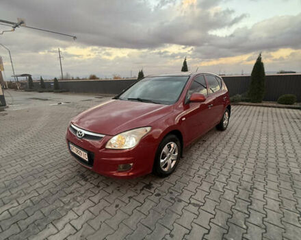 Красный Хендай i30, объемом двигателя 1.58 л и пробегом 244 тыс. км за 5400 $, фото 1 на Automoto.ua