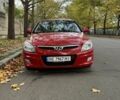 Красный Хендай i30, объемом двигателя 1.4 л и пробегом 212 тыс. км за 4300 $, фото 1 на Automoto.ua
