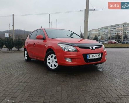 Красный Хендай i30, объемом двигателя 1.4 л и пробегом 208 тыс. км за 5700 $, фото 1 на Automoto.ua