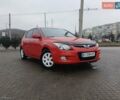 Красный Хендай i30, объемом двигателя 1.4 л и пробегом 208 тыс. км за 5700 $, фото 1 на Automoto.ua