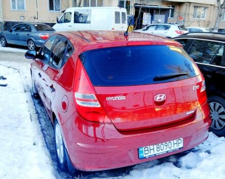 Красный Хендай i30, объемом двигателя 1.6 л и пробегом 156 тыс. км за 7300 $, фото 3 на Automoto.ua