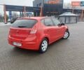 Красный Хендай i30, объемом двигателя 1.4 л и пробегом 208 тыс. км за 5700 $, фото 5 на Automoto.ua