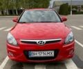 Красный Хендай i30, объемом двигателя 1.58 л и пробегом 236 тыс. км за 5000 $, фото 1 на Automoto.ua