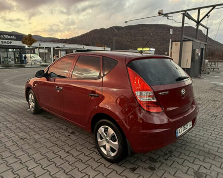Красный Хендай i30, объемом двигателя 1.58 л и пробегом 244 тыс. км за 5400 $, фото 2 на Automoto.ua