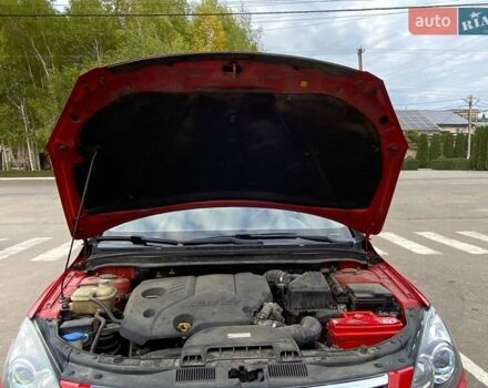 Красный Хендай i30, объемом двигателя 1.58 л и пробегом 236 тыс. км за 5000 $, фото 5 на Automoto.ua