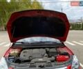 Красный Хендай i30, объемом двигателя 1.58 л и пробегом 236 тыс. км за 5000 $, фото 5 на Automoto.ua