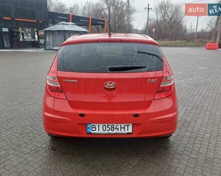 Красный Хендай i30, объемом двигателя 1.4 л и пробегом 208 тыс. км за 5700 $, фото 6 на Automoto.ua