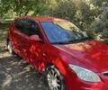 Красный Хендай i30, объемом двигателя 1.6 л и пробегом 284 тыс. км за 3001 $, фото 1 на Automoto.ua