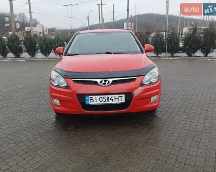 Красный Хендай i30, объемом двигателя 1.4 л и пробегом 208 тыс. км за 5700 $, фото 7 на Automoto.ua
