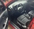 Красный Хендай i30, объемом двигателя 1.4 л и пробегом 101 тыс. км за 6500 $, фото 6 на Automoto.ua