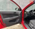 Красный Хендай i30, объемом двигателя 1.4 л и пробегом 234 тыс. км за 5250 $, фото 11 на Automoto.ua