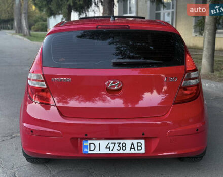 Красный Хендай i30, объемом двигателя 1.6 л и пробегом 161 тыс. км за 7000 $, фото 8 на Automoto.ua