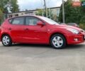 Красный Хендай i30, объемом двигателя 1.4 л и пробегом 201 тыс. км за 6500 $, фото 7 на Automoto.ua