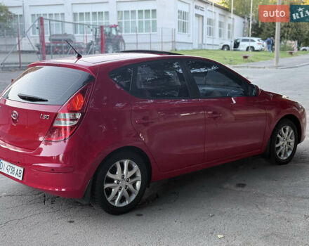 Красный Хендай i30, объемом двигателя 1.6 л и пробегом 161 тыс. км за 7000 $, фото 10 на Automoto.ua