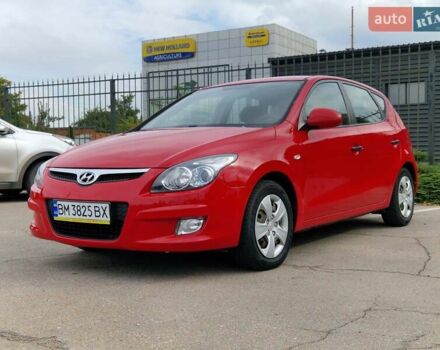 Красный Хендай i30, объемом двигателя 1.4 л и пробегом 201 тыс. км за 6500 $, фото 1 на Automoto.ua