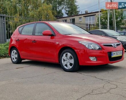 Красный Хендай i30, объемом двигателя 1.4 л и пробегом 201 тыс. км за 6500 $, фото 6 на Automoto.ua
