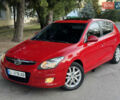 Красный Хендай i30, объемом двигателя 1.6 л и пробегом 161 тыс. км за 7000 $, фото 1 на Automoto.ua