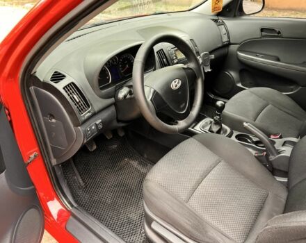Червоний Хендай i30, об'ємом двигуна 1.4 л та пробігом 290 тис. км за 5200 $, фото 7 на Automoto.ua