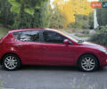 Красный Хендай i30, объемом двигателя 1.6 л и пробегом 161 тыс. км за 7000 $, фото 6 на Automoto.ua