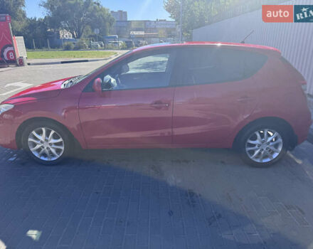 Красный Хендай i30, объемом двигателя 1.6 л и пробегом 159 тыс. км за 7399 $, фото 3 на Automoto.ua
