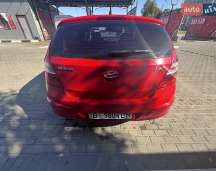 Красный Хендай i30, объемом двигателя 1.6 л и пробегом 159 тыс. км за 7399 $, фото 4 на Automoto.ua