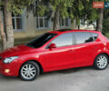 Красный Хендай i30, объемом двигателя 1.6 л и пробегом 161 тыс. км за 7000 $, фото 1 на Automoto.ua