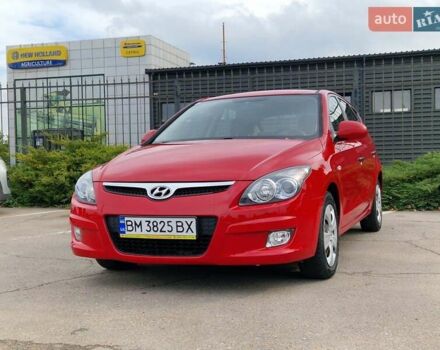 Красный Хендай i30, объемом двигателя 1.4 л и пробегом 201 тыс. км за 6500 $, фото 2 на Automoto.ua