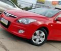 Красный Хендай i30, объемом двигателя 1.4 л и пробегом 201 тыс. км за 6500 $, фото 1 на Automoto.ua