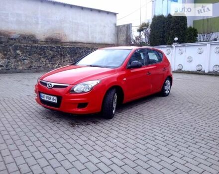 Красный Хендай i30, объемом двигателя 1.4 л и пробегом 154 тыс. км за 4700 $, фото 1 на Automoto.ua