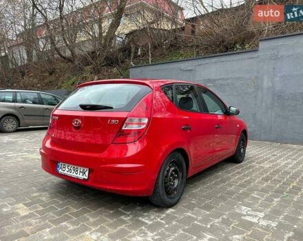 Красный Хендай i30, объемом двигателя 1.4 л и пробегом 234 тыс. км за 5250 $, фото 22 на Automoto.ua