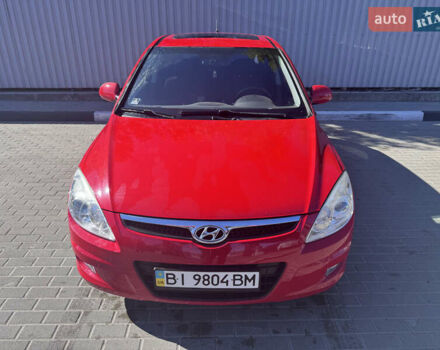Красный Хендай i30, объемом двигателя 1.6 л и пробегом 159 тыс. км за 7399 $, фото 1 на Automoto.ua