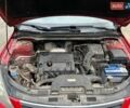 Красный Хендай i30, объемом двигателя 1.4 л и пробегом 234 тыс. км за 5250 $, фото 2 на Automoto.ua