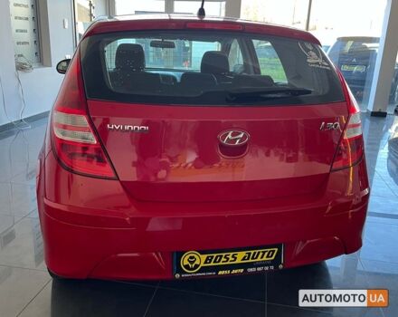 Красный Хендай i30, объемом двигателя 1.4 л и пробегом 182 тыс. км за 6300 $, фото 5 на Automoto.ua