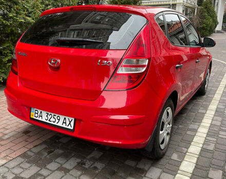 Красный Хендай i30, объемом двигателя 1.59 л и пробегом 195 тыс. км за 7200 $, фото 2 на Automoto.ua