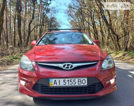 Червоний Хендай i30, об'ємом двигуна 1.6 л та пробігом 160 тис. км за 7600 $, фото 1 на Automoto.ua