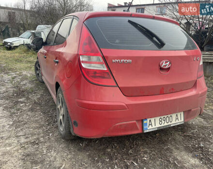 Червоний Хендай i30, об'ємом двигуна 1.59 л та пробігом 265 тис. км за 6250 $, фото 4 на Automoto.ua