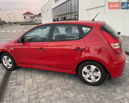 Красный Хендай i30, объемом двигателя 1.58 л и пробегом 178 тыс. км за 5650 $, фото 1 на Automoto.ua