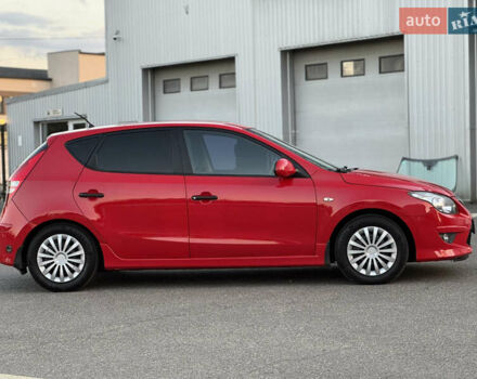 Красный Хендай i30, объемом двигателя 1.59 л и пробегом 165 тыс. км за 6950 $, фото 1 на Automoto.ua