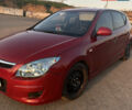 Красный Хендай i30, объемом двигателя 1.59 л и пробегом 227 тыс. км за 6200 $, фото 4 на Automoto.ua
