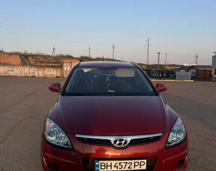 Красный Хендай i30, объемом двигателя 1.59 л и пробегом 227 тыс. км за 6200 $, фото 3 на Automoto.ua